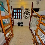 Straw Hat Hostel & Rooftop Bar