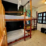 Straw Hat Hostel & Rooftop Bar