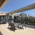 Unwind | Private Balcony & Rooftop Pools | Casago