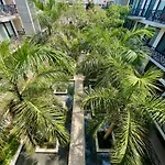 Unwind | Private Balcony & Rooftop Pools | Casago