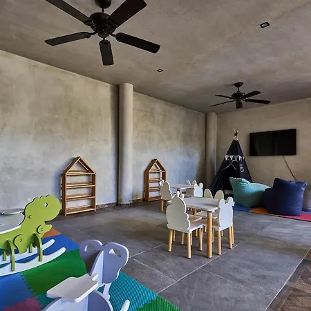 Serene Studio With Premium Location In With Private Balcony, Kid's Area, Outdoor Seating & Pool