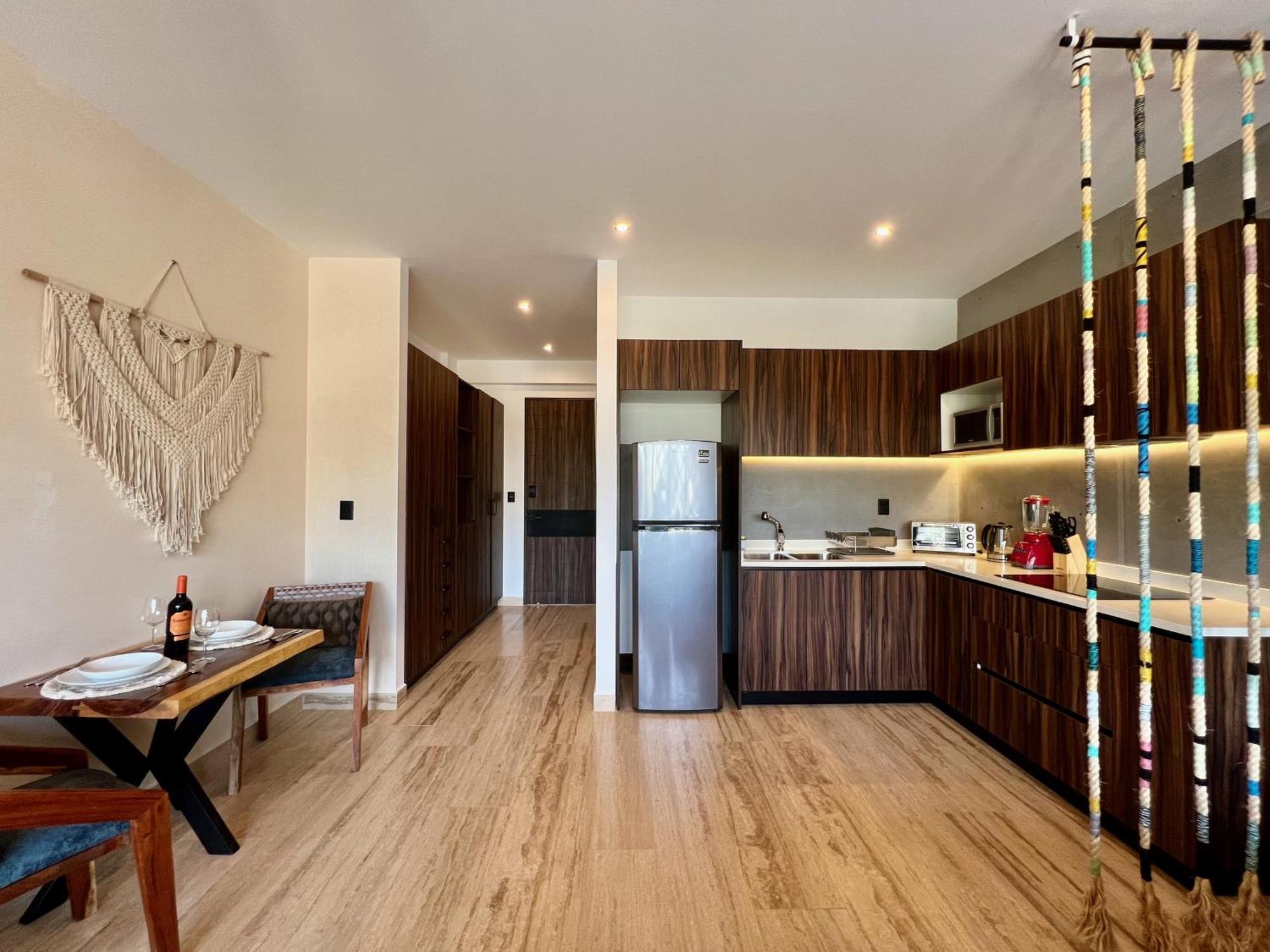 Unwind | Private Balcony & Rooftop Pools | Casago Tulum