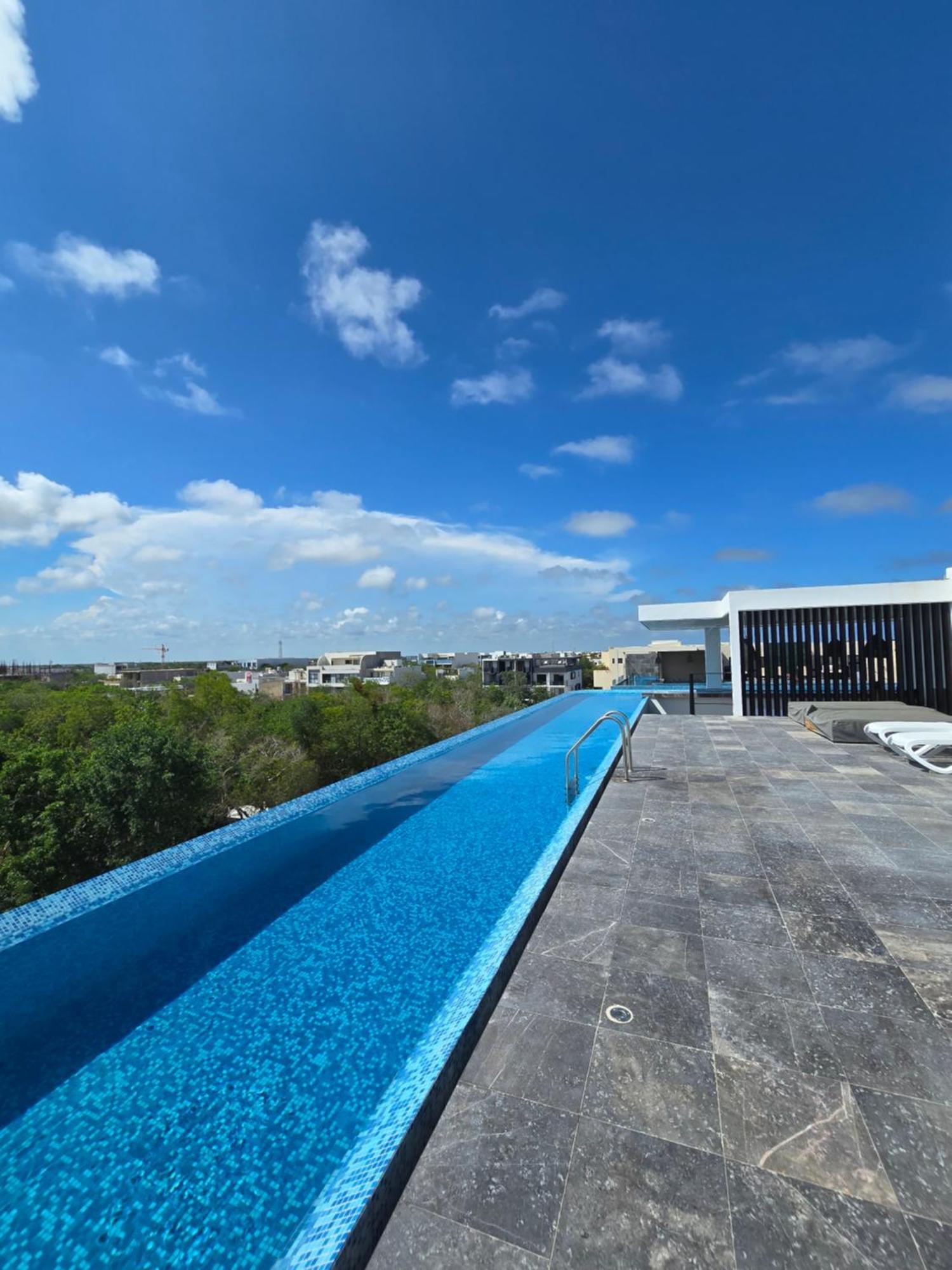 Cozy Aldea Zama Wifi Alberca Apartment