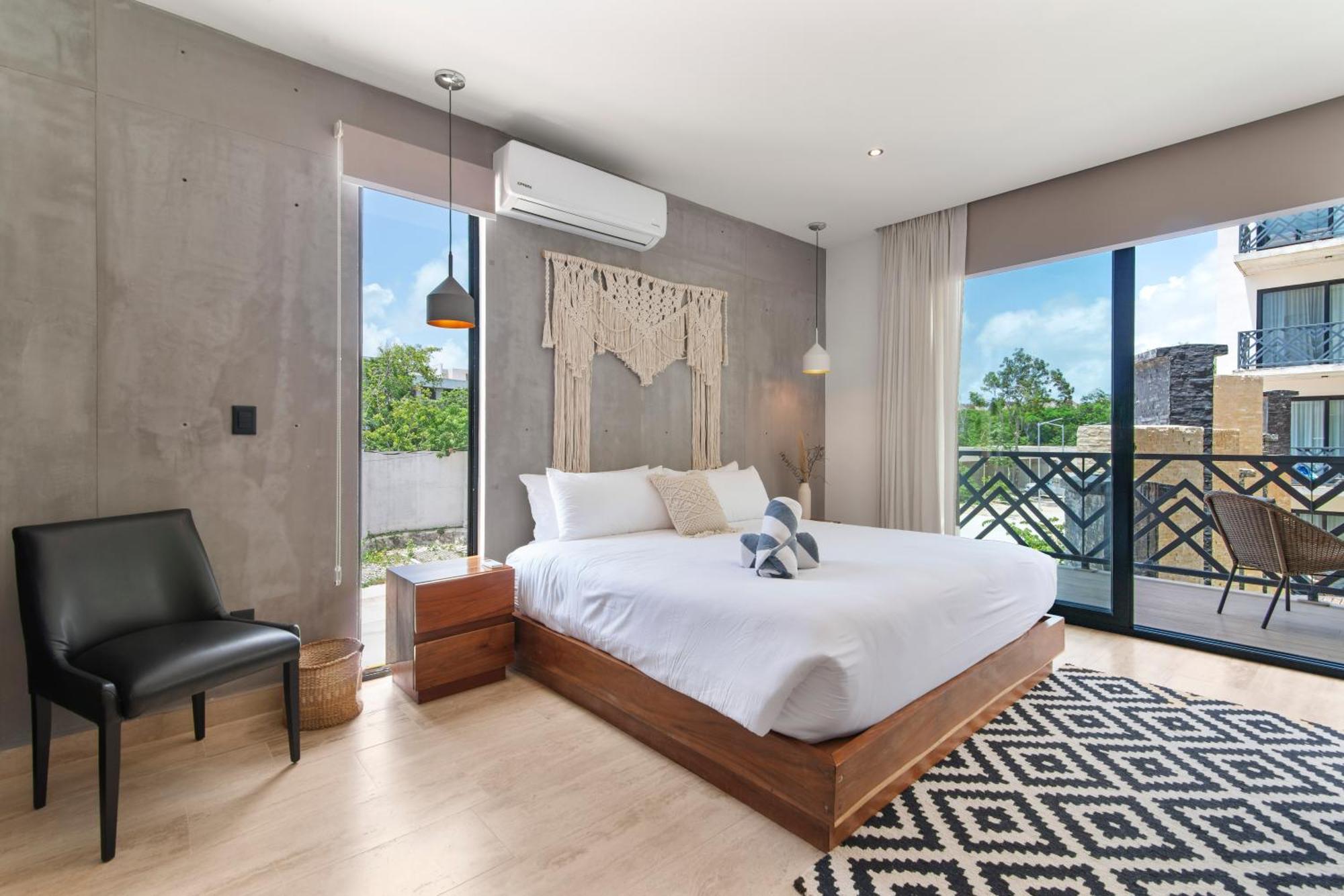 Unwind | Private Balcony & Rooftop Pools | Casago *