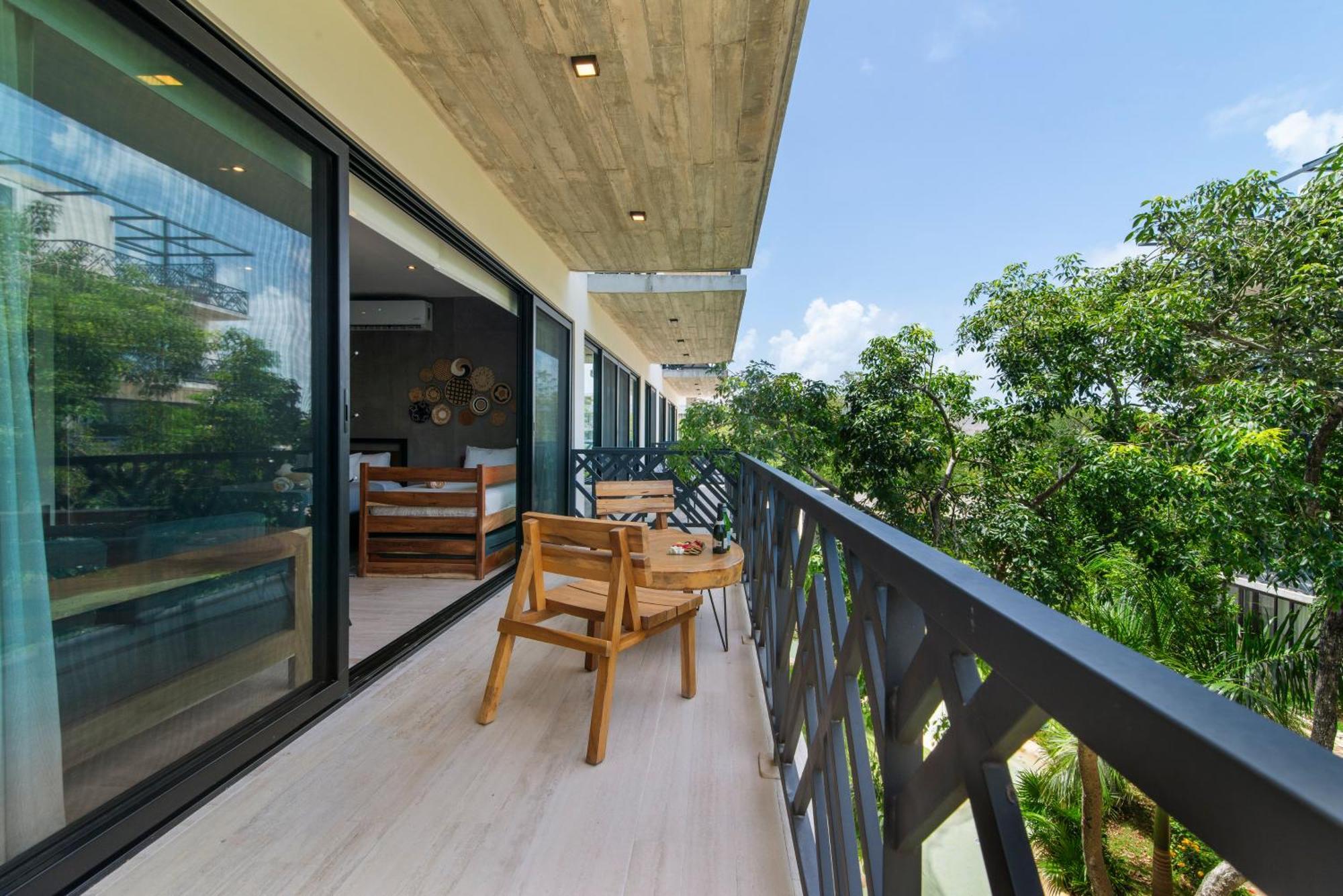 Unwind | Private Balcony & Rooftop Pools | Casago Tulum