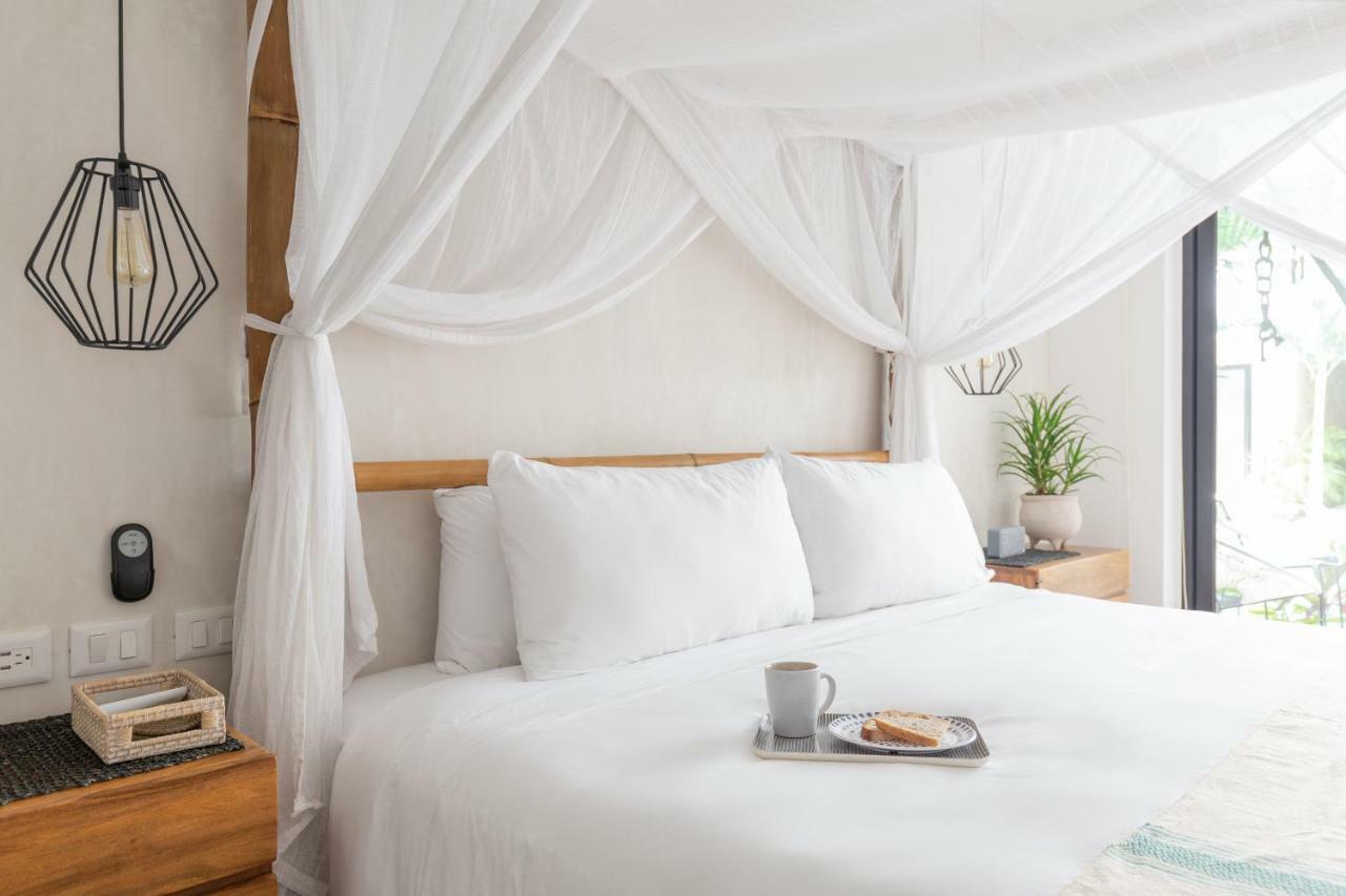 Beautifully Minimalistic Studio Wrapped In Nature By Stella Tulum
