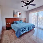 1 Bedroom With King Bed And Balcony With Amenities View