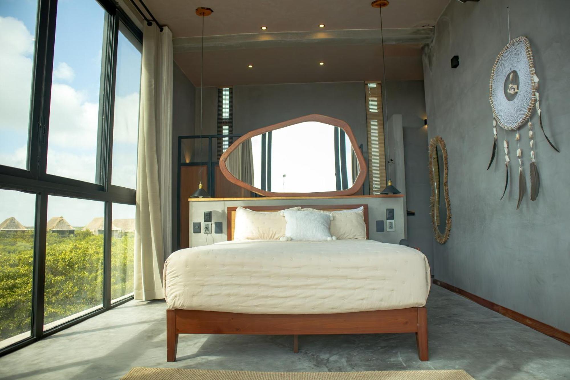 Caiman Habitat Hotel