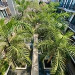 Unwind | Private Balcony & Rooftop Pools | Casago