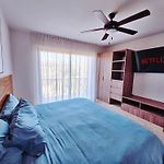 1 Bedroom With King Bed And Balcony With Amenities View