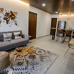 Macondo Apartahotel