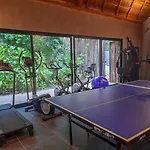 Macondo Apartahotel