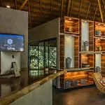 Macondo Apartahotel