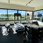 Loft increíble king size Alberca infinita,Gym en medio de la selva