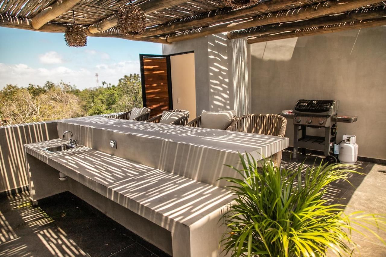 Macondo Apartahotel