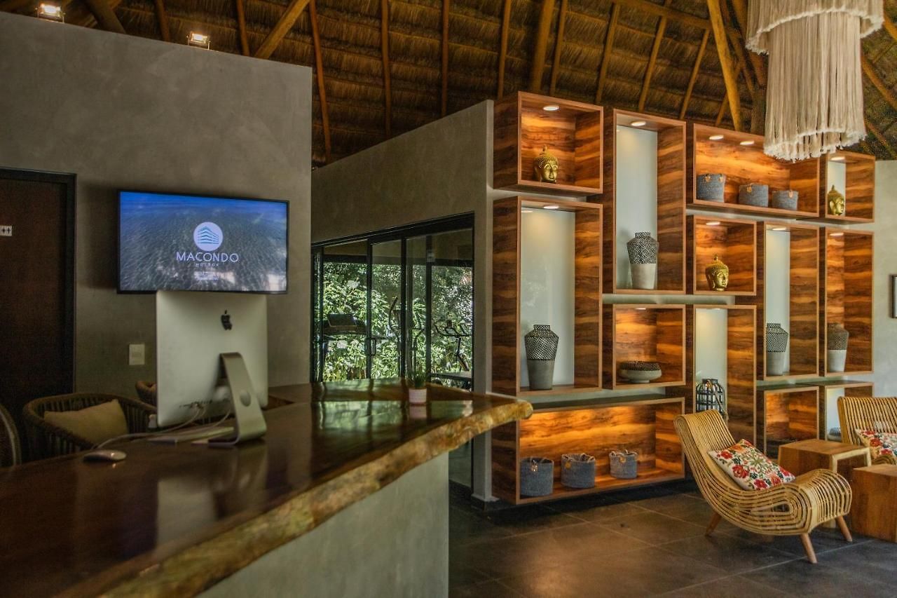 Macondo Apartahotel
