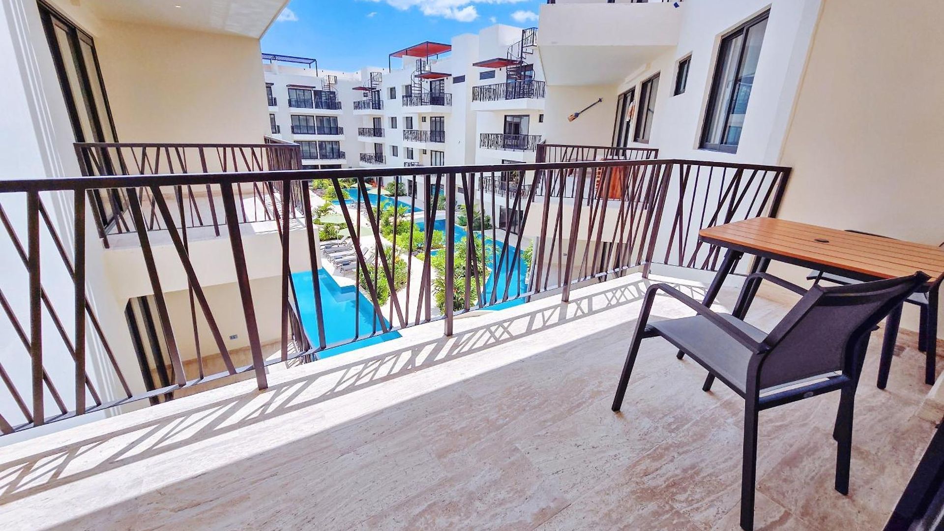 Apartment 1 Bedroom With King Bed And Balcony With Amenities View