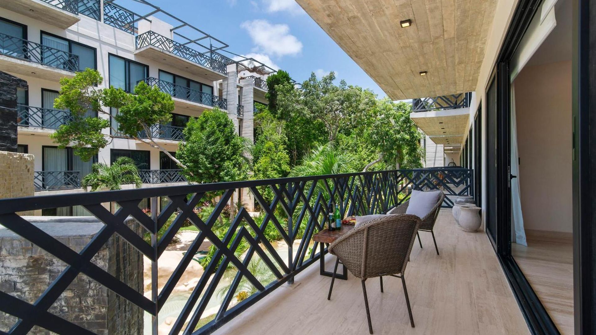 Unwind | Private Balcony & Rooftop Pools | Casago