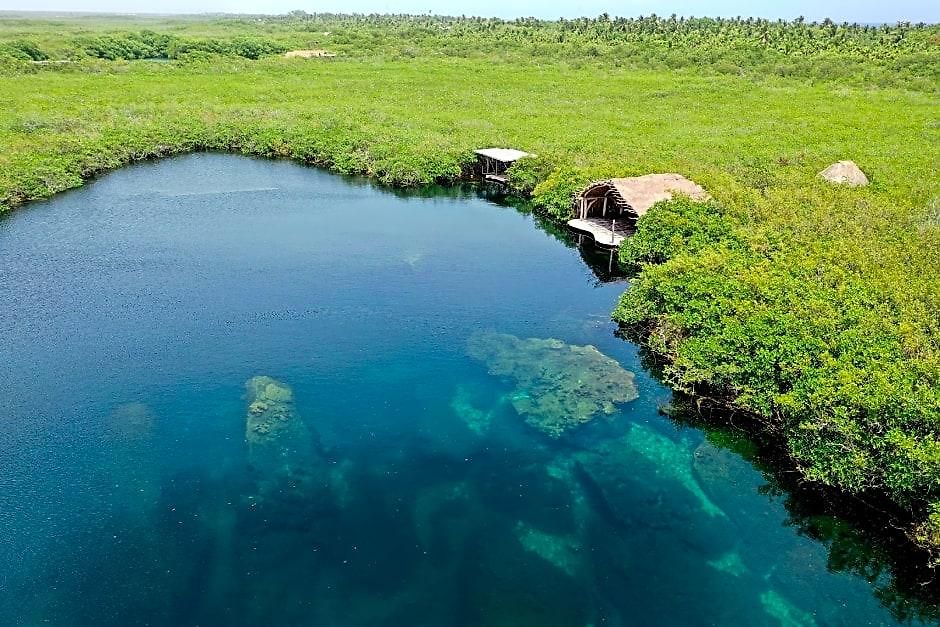 Hotel Cormoran & Cenote Tulum