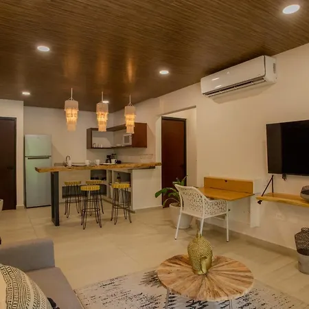 Macondo Apartahotel