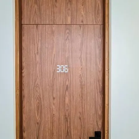 By Apartment