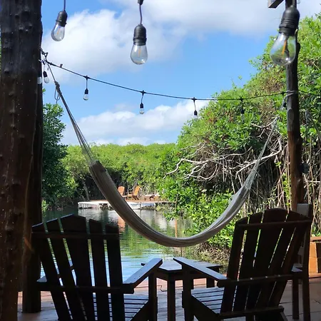 - Aldea Mangle & Cenote Lodge Tulum
