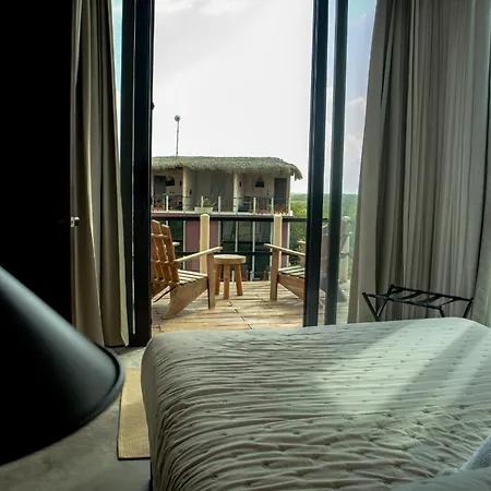 Caiman Habitat Hotel
