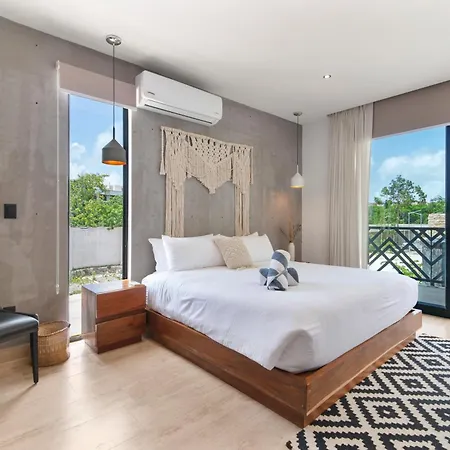 Unwind | Private Balcony & Rooftop Pools | Casago *