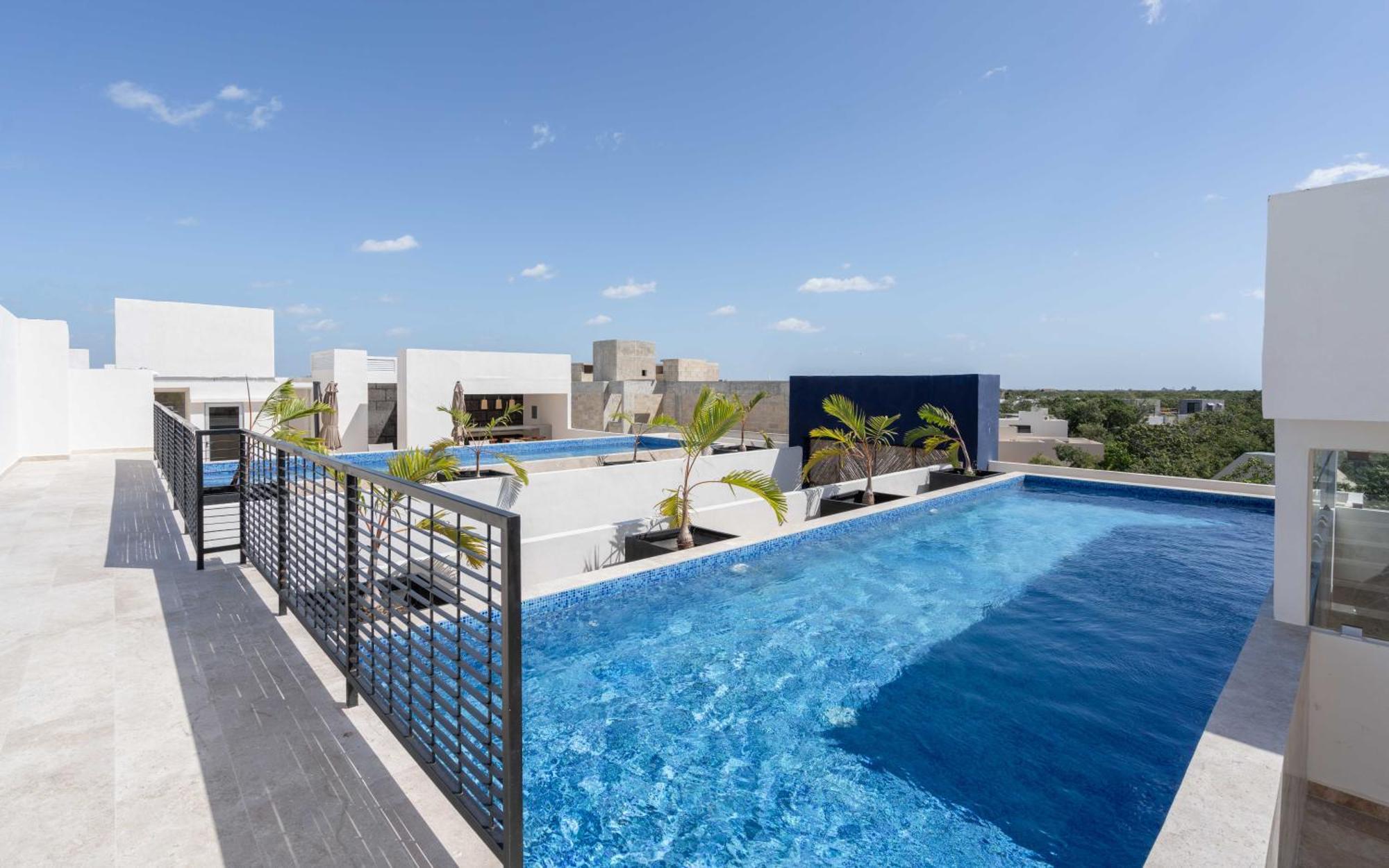 Holiday home 2bd With Rooftop Pool Near