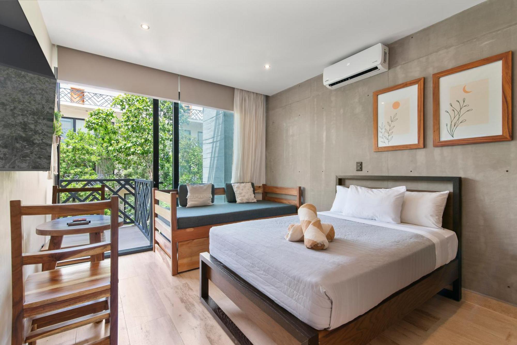 Unwind | Private Balcony & Rooftop Pools | Casago