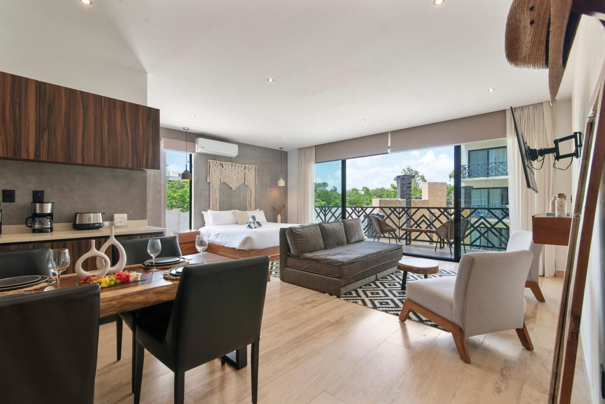 Unwind | Private Balcony & Rooftop Pools | Casago